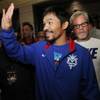 Manny Pacquiao arrives with Hall of Fame trainer Freddie Roach at the Venetian Macao in Macau, China, on Tuesday, Nov. 19, 2013, for his upcoming fight against former world champion Brandon "Bam Bam" Rios. Manny Pacquiao arrives with Hall of Fame trainer Freddie Roach at the Venetian Macao in Macau, China, on Tuesday, Nov. 19, 2013, for his upcoming fight against former world champion Brandon "Bam Bam" Rios.